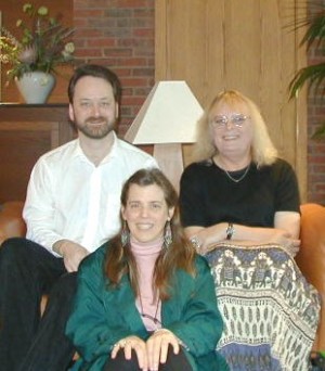 HeroicStories publisher Randy Cassingham with Paulette and (front) Managing Editor Kit Riley, who championed, and edited, Paulette's story. 